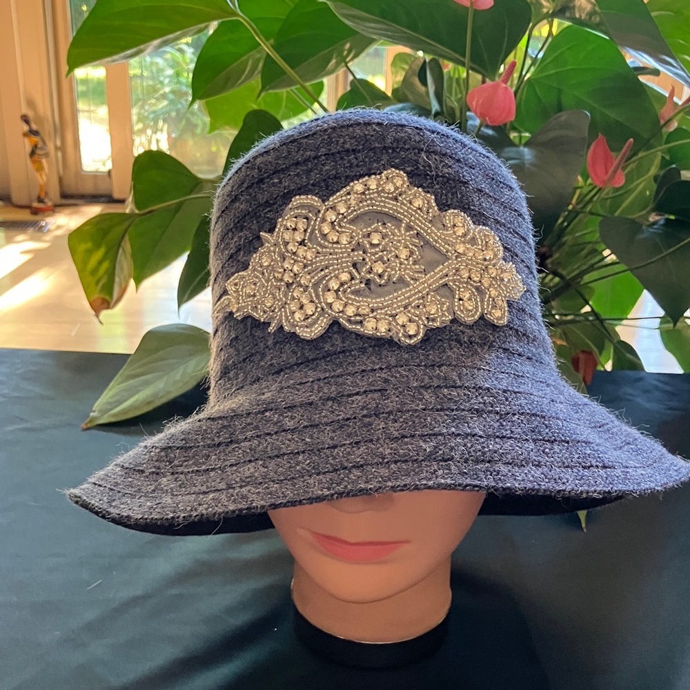 Elegant Black Hat with Silver Embellishment